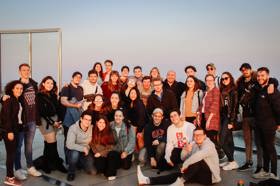 Group of people celebrating on stage