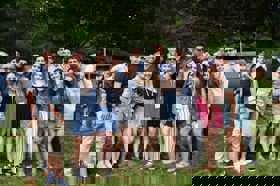 Group of people celebrating on stage