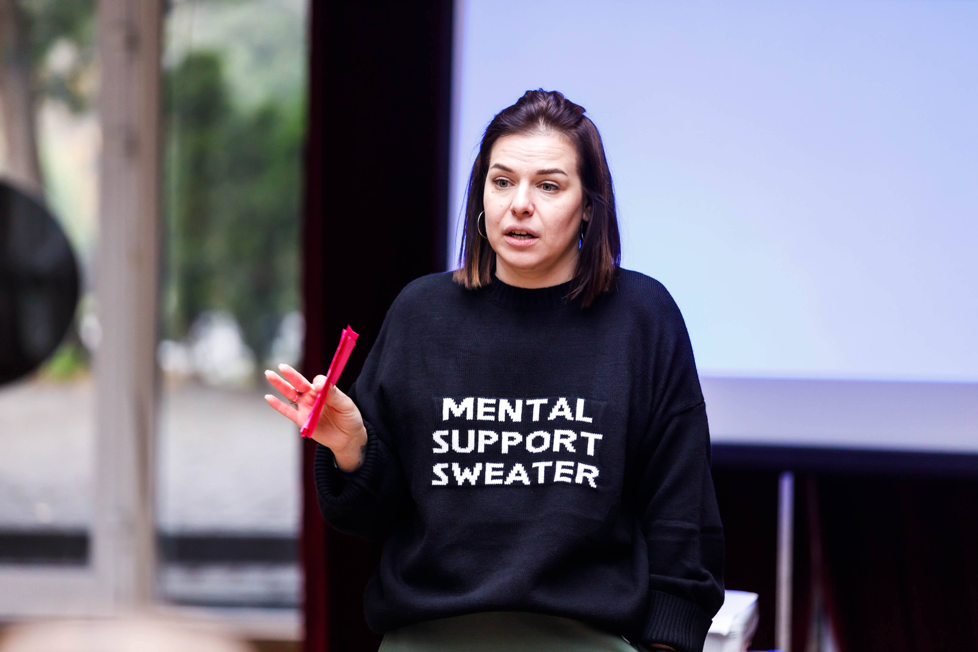 Group of people celebrating on stage