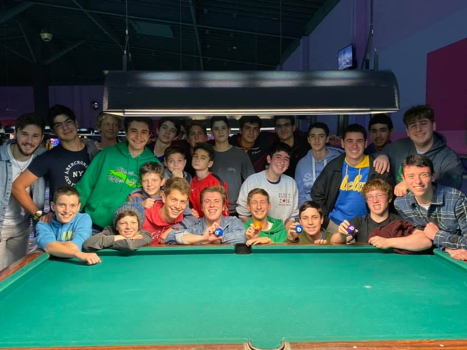 Group of people celebrating on stage