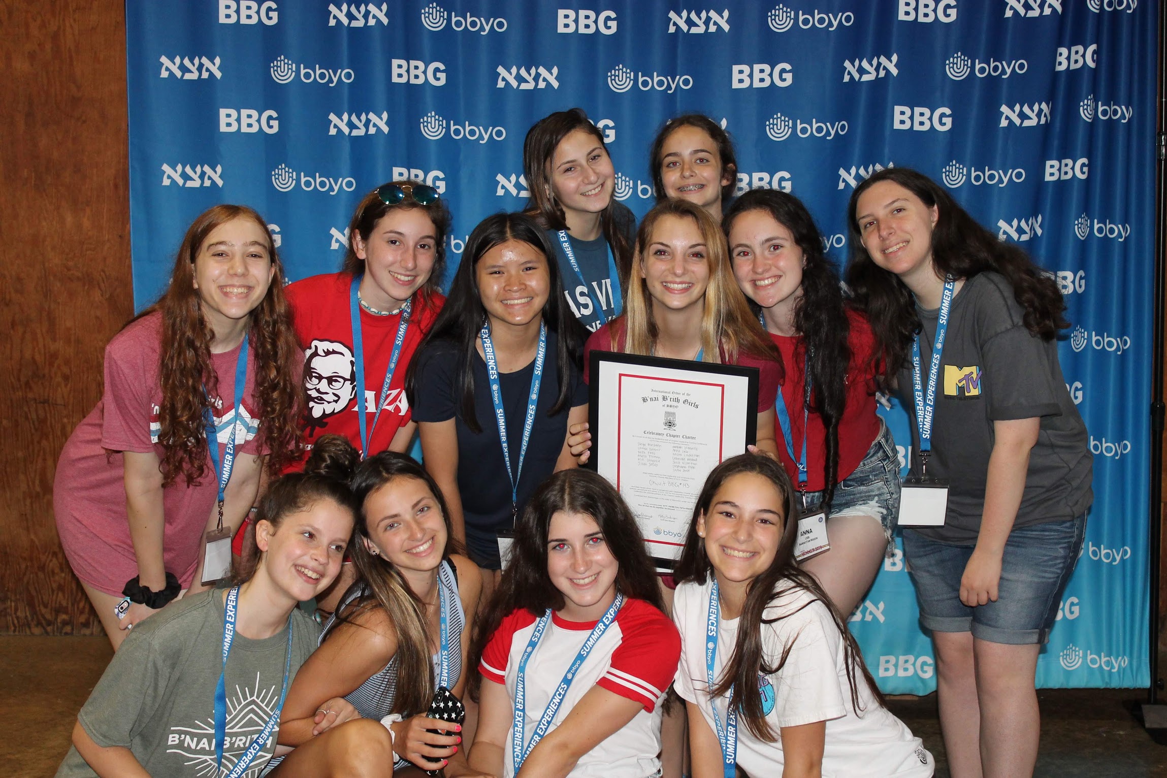 Group of people celebrating on stage