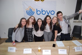 Group of people celebrating on stage