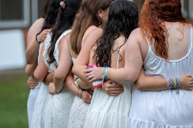 Group of people celebrating on stage