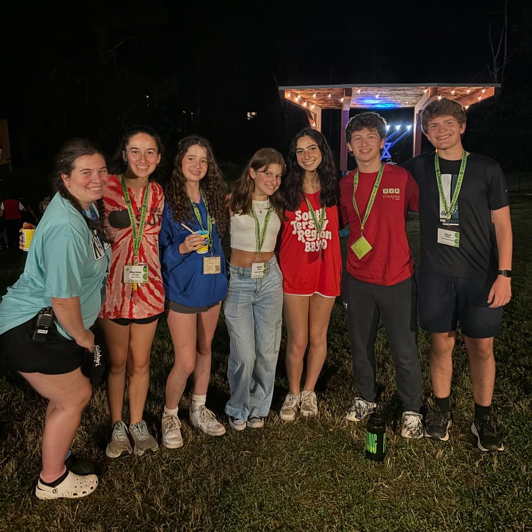 Group of people celebrating on stage