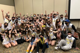 Group of people celebrating on stage