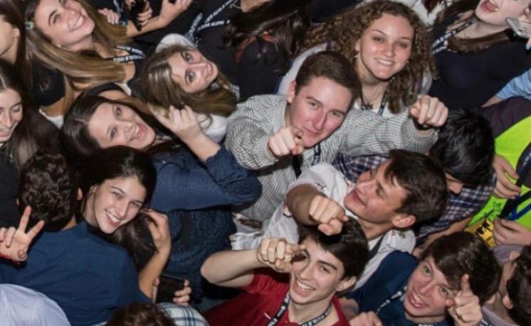Group of people celebrating on stage