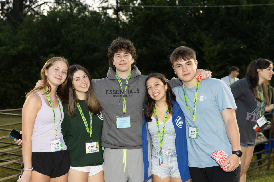 Group of people celebrating on stage