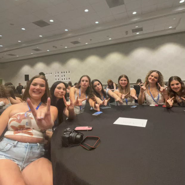 Group of people celebrating on stage