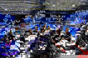 Group of people celebrating on stage