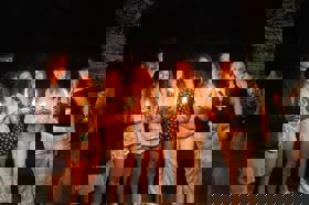 Group of people celebrating on stage