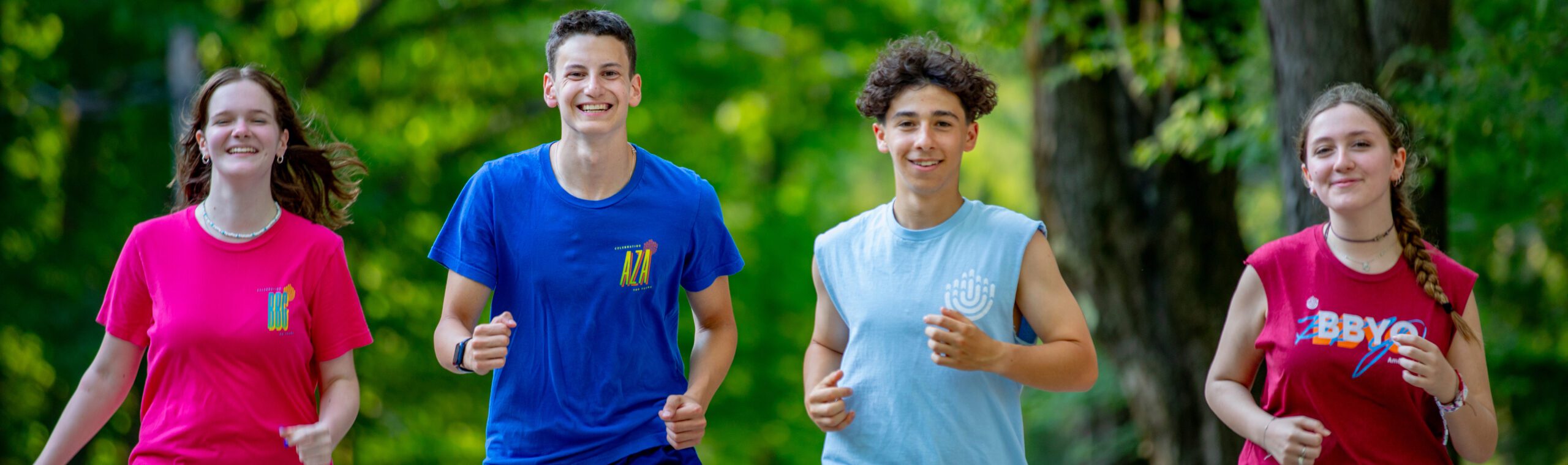 Group of diverse young people smiling at a community event