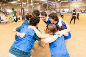 Group of people celebrating on stage