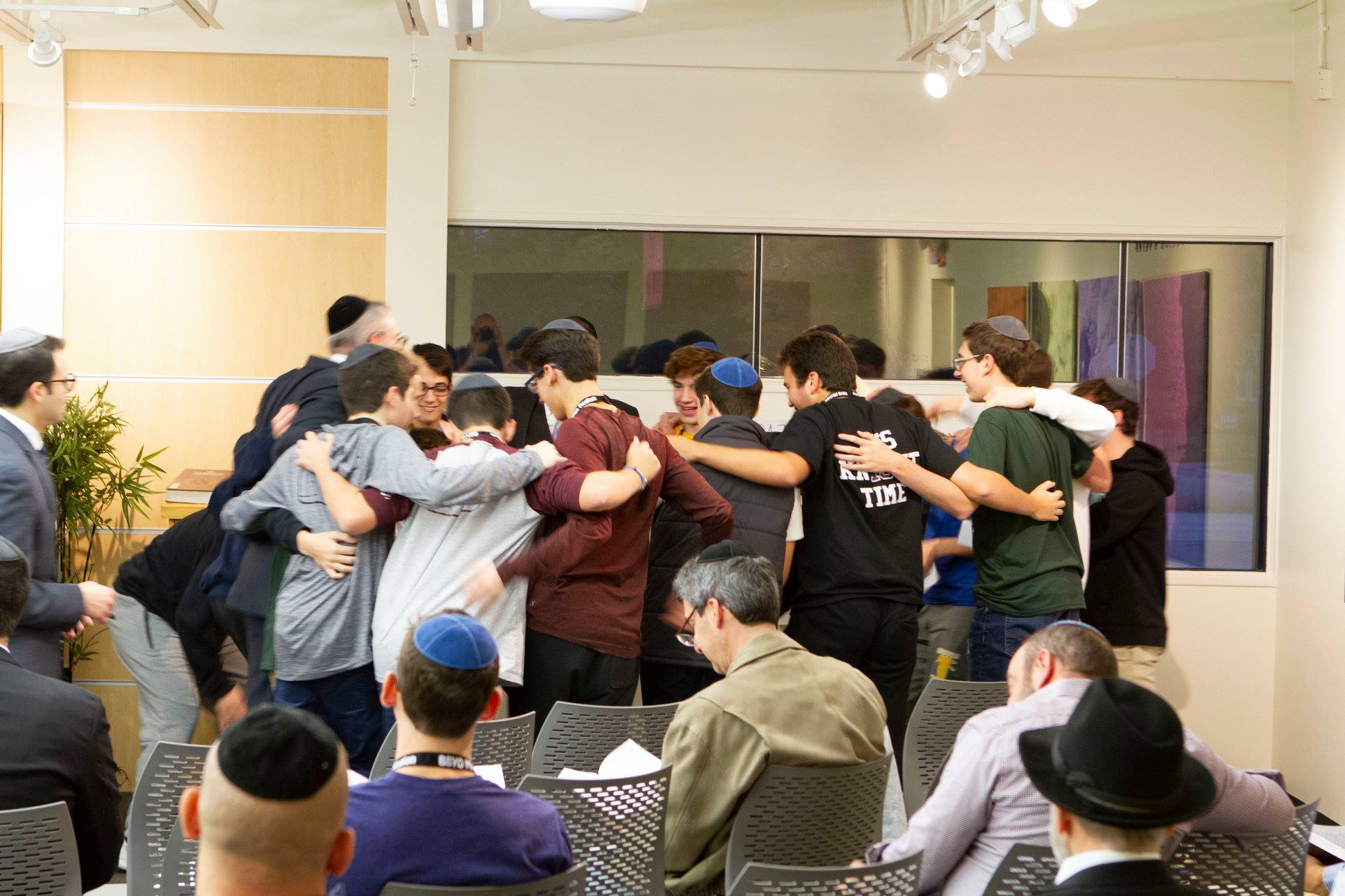 Group of people celebrating on stage