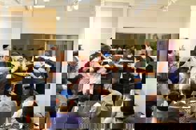 Group of people celebrating on stage