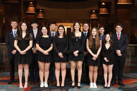 Group of people celebrating on stage