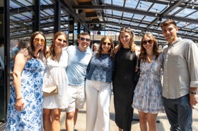 Group of people celebrating on stage