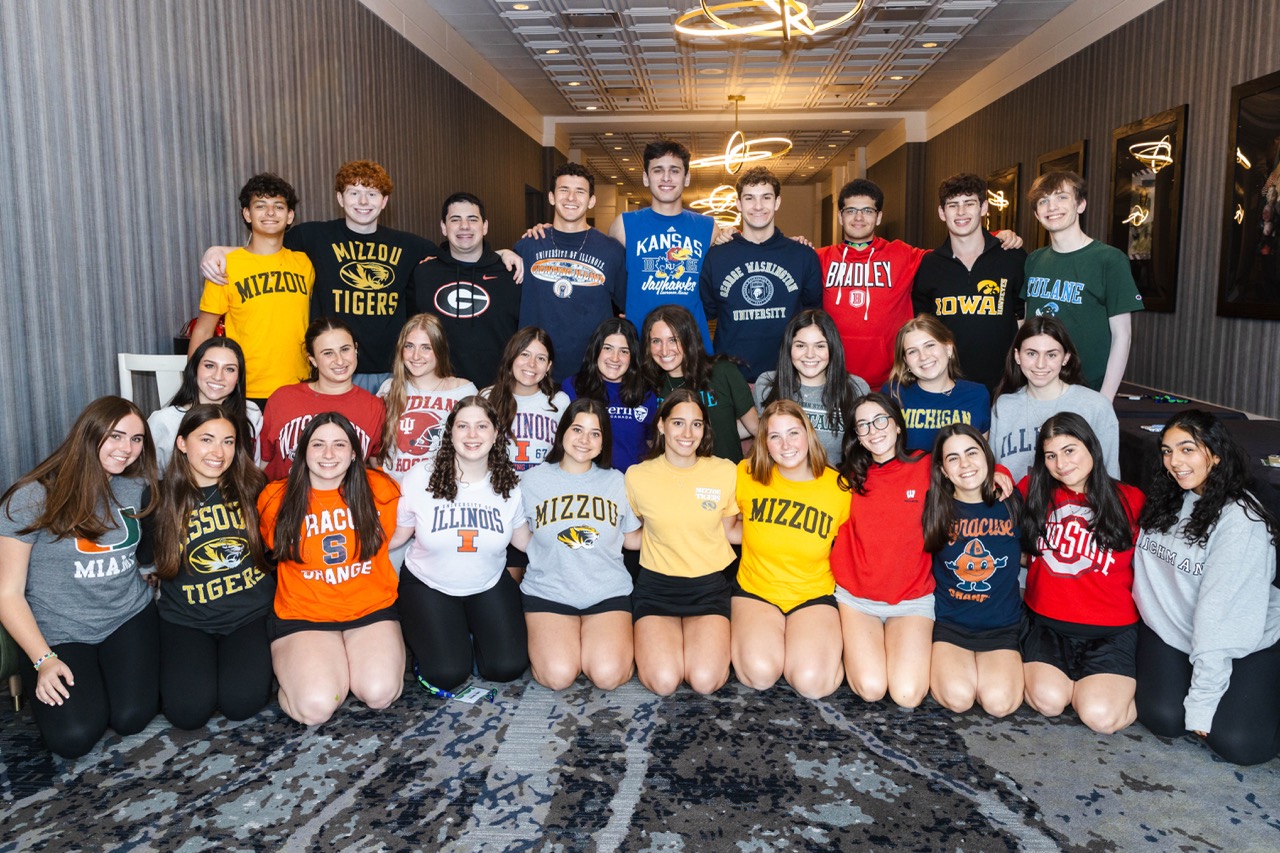 Group of people celebrating on stage