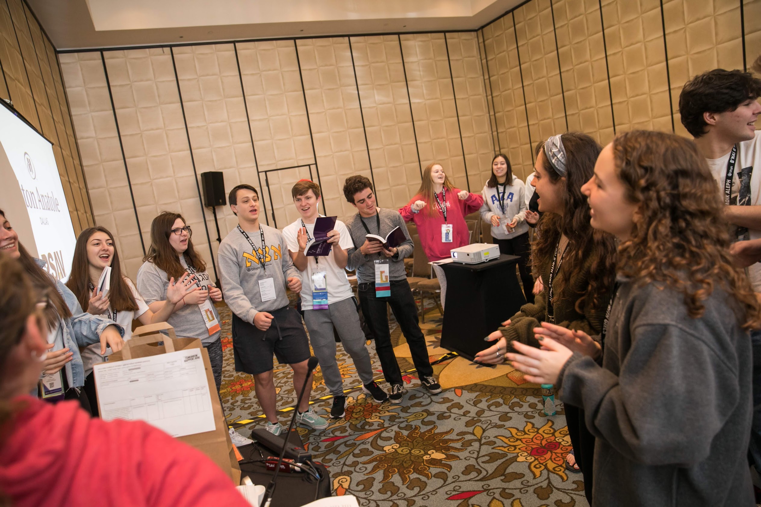 Group of people celebrating on stage