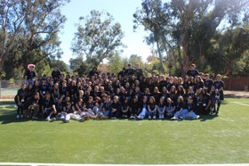 Group of people celebrating on stage