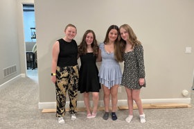 Group of people celebrating on stage