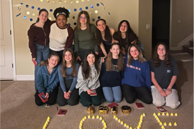 Group of people celebrating on stage