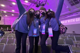 Group of people celebrating on stage