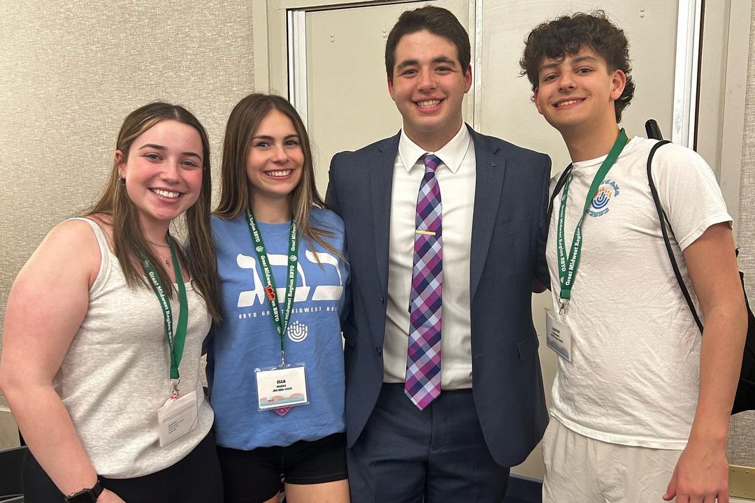 Group of people celebrating on stage