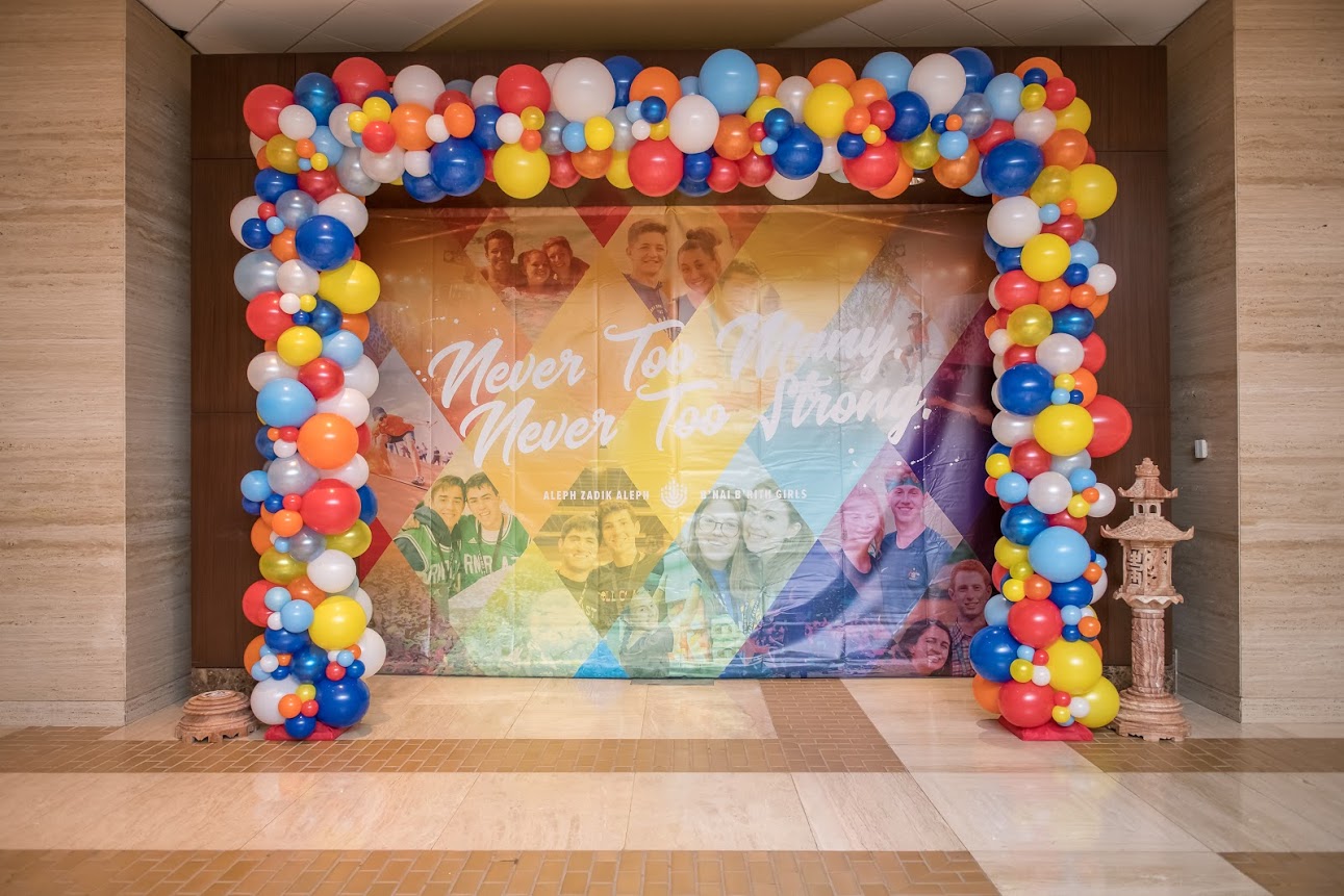 Group of people celebrating on stage