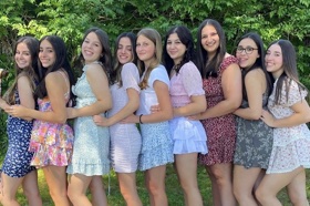 Group of people celebrating on stage