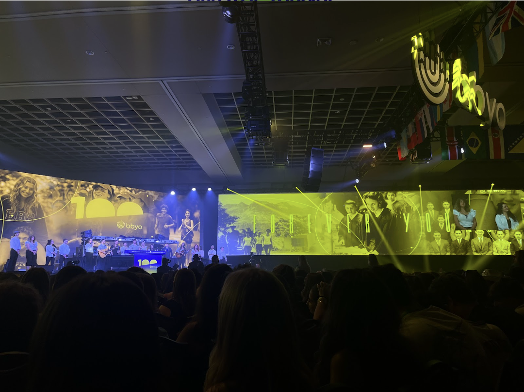 Group of people celebrating on stage
