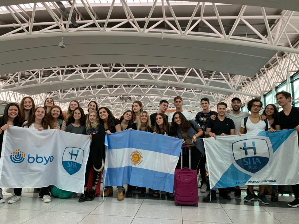 Group of people celebrating on stage