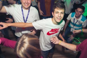 Group of people celebrating on stage