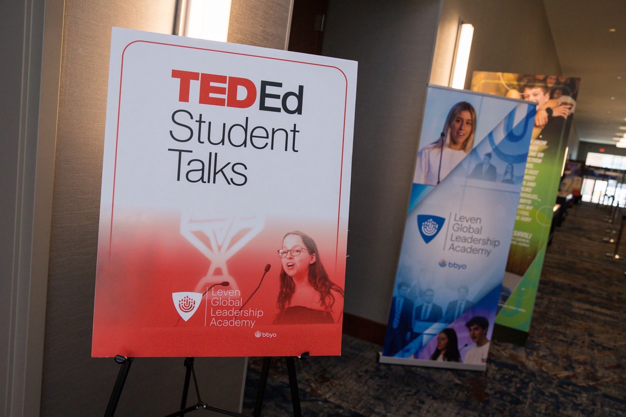 Group of people celebrating on stage