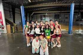 Group of people celebrating on stage