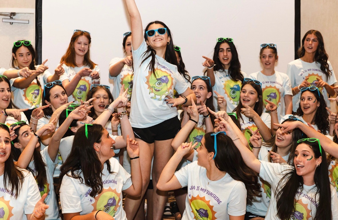 Group of people celebrating on stage