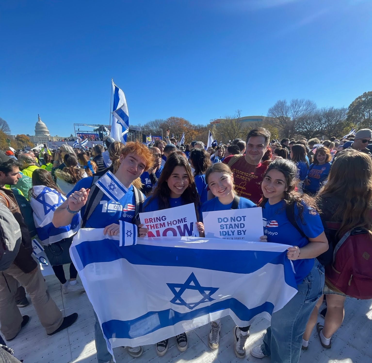 Group of people celebrating on stage