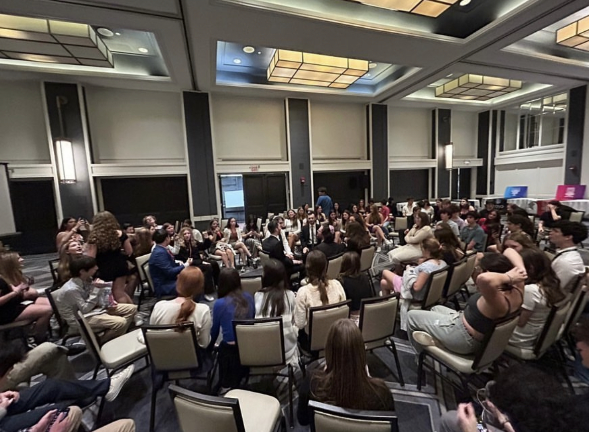 Group of people celebrating on stage