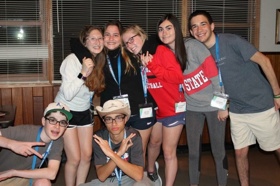 Group of people celebrating on stage