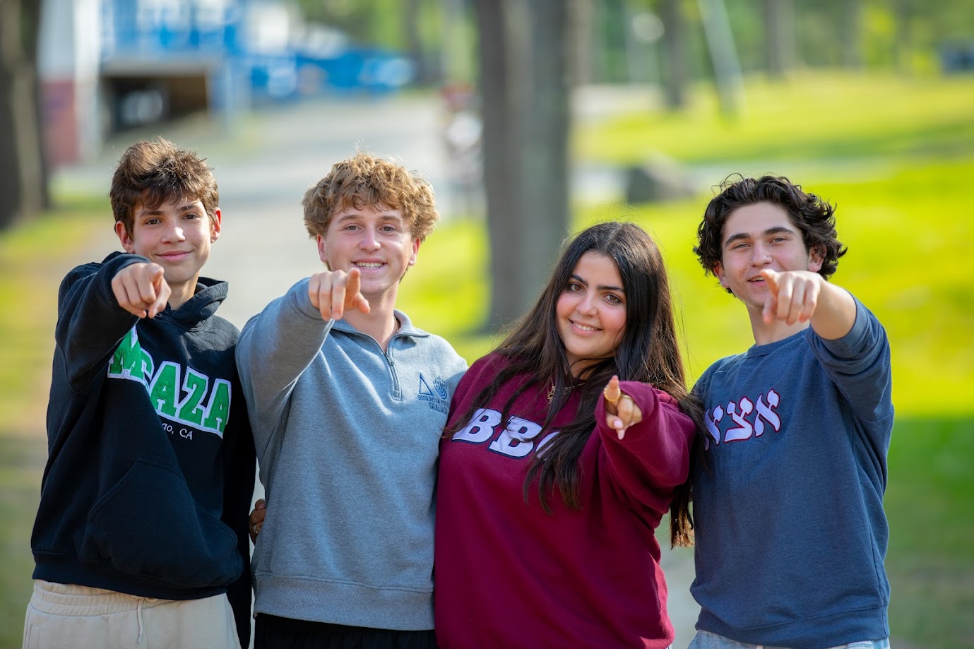 Group of people smiling outdoors