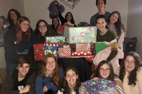 Group of people celebrating on stage