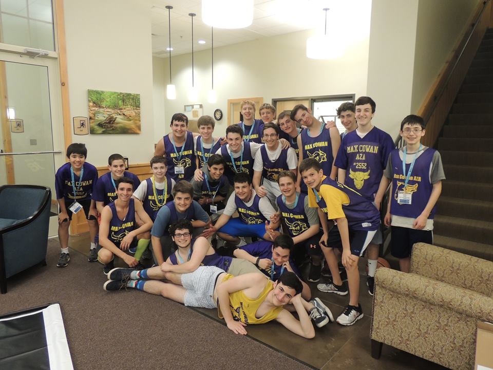 Group of people celebrating on stage