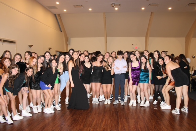 Group of people celebrating on stage