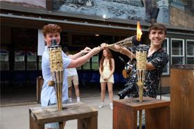 Group of people celebrating on stage
