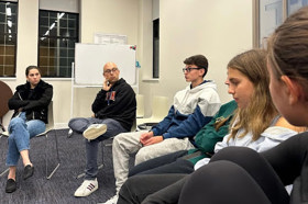 Group of people celebrating on stage