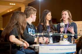 Group of people celebrating on stage