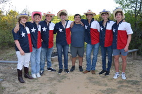 Group of people celebrating on stage