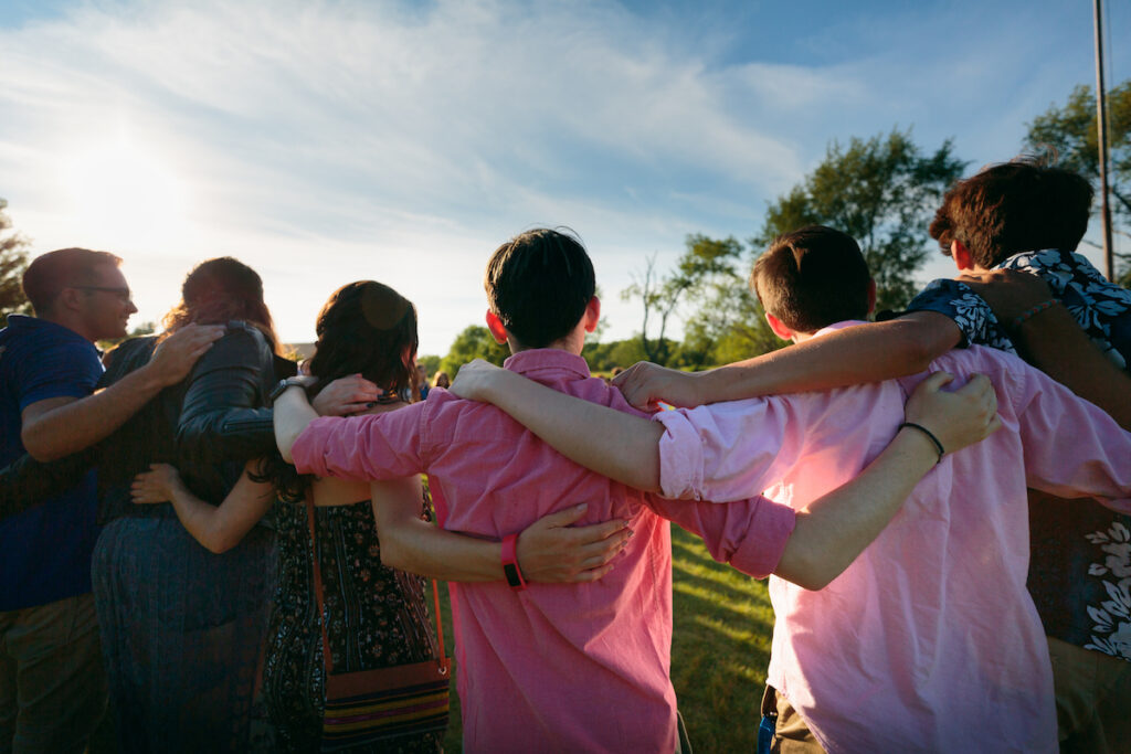 Group of people celebrating on stage