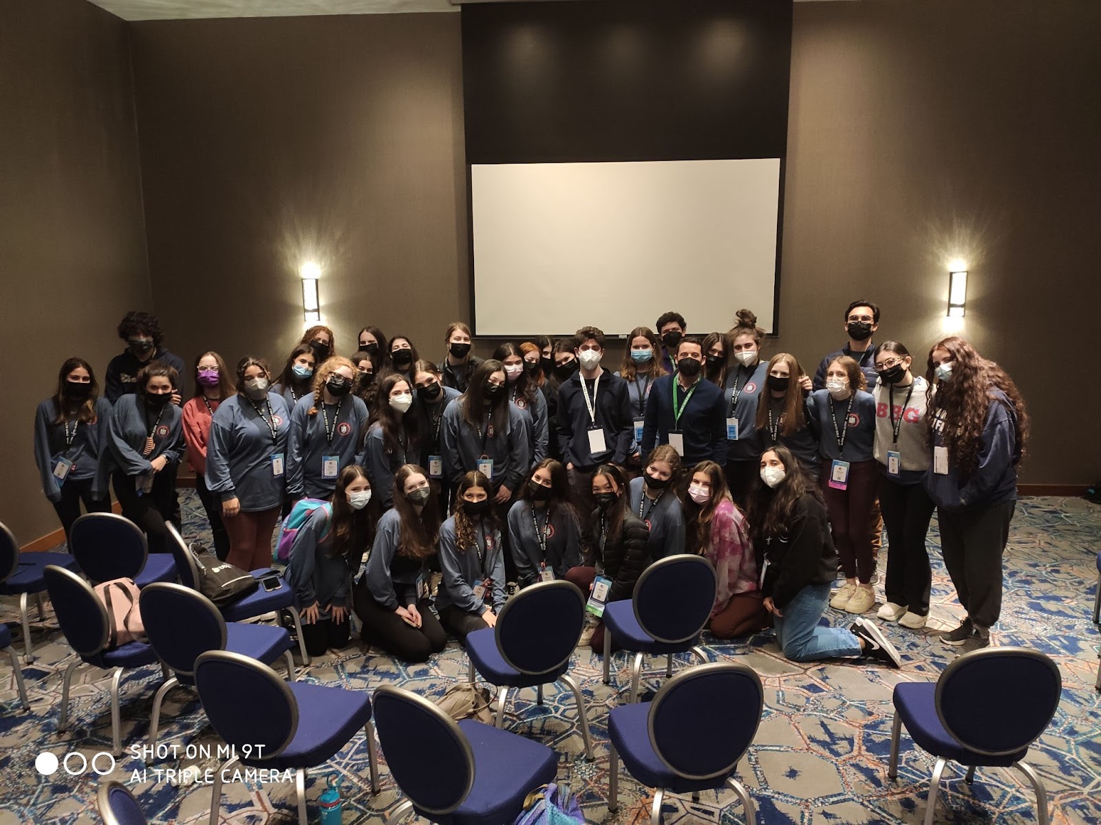 Group of people celebrating on stage