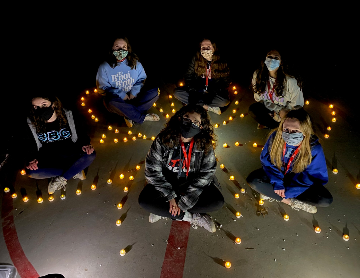 Group of people celebrating on stage