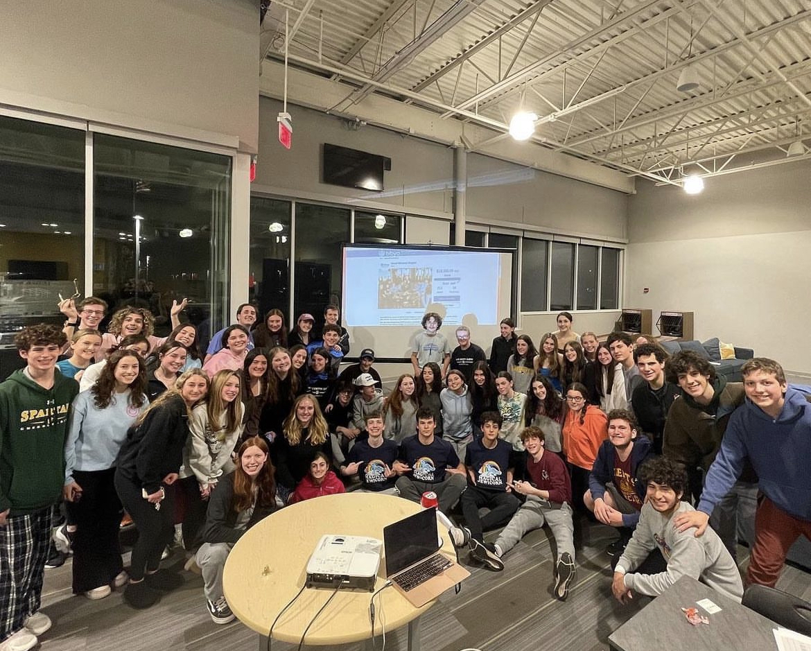 Group of people celebrating on stage
